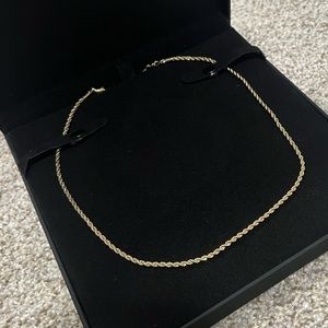 Gold colored rope chain necklace